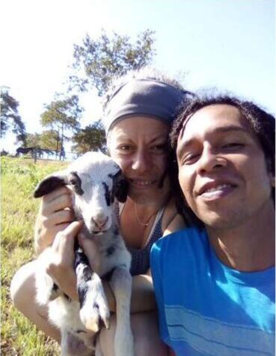 The Estero Tours family with one of their goats